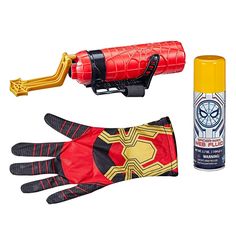 spider - man glove, gloves, and spray can are shown in this set up