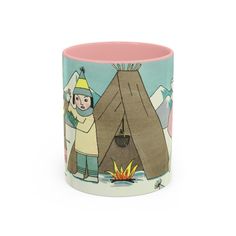 a ceramic mug with an image of two people standing in front of a teepee