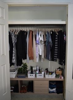 an organized closet with clothes and shoes