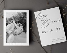 an image of a couple kissing in front of their wedding announcement card and save the date cards