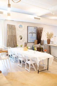 a white table and chairs in a room