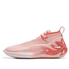 a pink sneaker with an orange and white design on the upper part of it