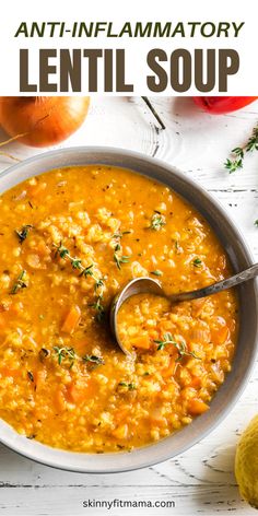 a bowl of lentil soup with a spoon in it