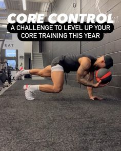 a man is doing push ups in a gym with the words core control above him