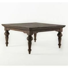 a wooden table with two legs and a square top