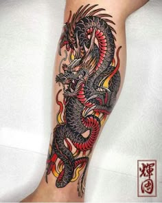 a person with a dragon tattoo on their arm and leg, next to a white background