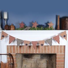 a mantel decorated with red, white and blue flags