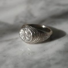 The MELT signet ring is hand carved from jewellers wax and cast using the ancient 'Lost Wax Casting' method and then hand finished to reveal this unique design that celebrates texture. Available in Eco sterling silver or brass. The silver MELT signet is hallmarked by the British Assay Office. This ring is designed as an homage to the centuries and millennia old goldsmith's skills that are still used to this day. In celebration of the hand made, this signet features an irregular file mark texture Signet Engagement Rings, Wax Carving Jewelry, Carving Jewelry, Wax Carving, Silver Signet Ring, Wax Casting, Lost Wax Casting, Lost Wax, Signet Ring