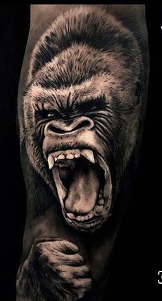 a man's arm with an angry gorilla tattoo on it