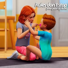 two children sitting on the floor playing with each other and one is touching her face