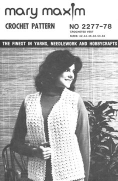 a woman standing next to a potted plant wearing a crochet vest