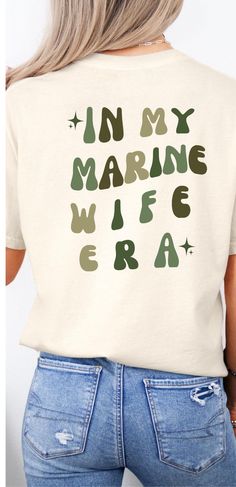 Are you looking for the perfect Personalized In My Military Wife Era Shirt, Marine Wife Shirt, Navy Wife Shirt, Air Force Wife Shirt, Army Wife Shirt, Coast Guard Wife, then look no further! Comfort Colors introduces the "Comfort Colors 1717" garment-dyed t-shirt; a fully customizable tee made 100% with ring-spun cotton. The soft-washed, garment-dyed fabric brings extra coziness to your wardrobe while the relaxed fit makes it an excellent daily choice. The double-needle stitching throughout the Air Force Wife Shirt, Coast Guard Wife, Air Force Wife, Airforce Wife, Marine Wife, Navy Wife, Army Wife, Military Wife, Coast Guard