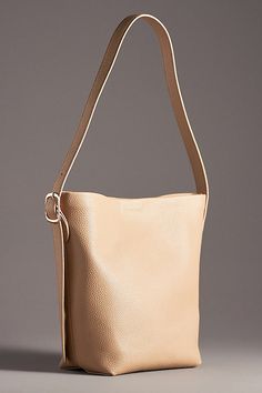 Polyurethane Removable zip-top pouch Magnetic closure Imported | Everyday Bucket Tote by Anthropologie in Beige, Women's, Polyurethane Bucket Tote, Perfect Handbag, Unique Bags, Leather Bucket, Bags Purses, Pouch Bag, Green Bag, White Bag, Blue Bags