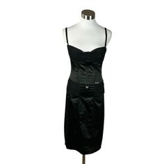 Galliano Vintage Y2k 2000’s Collection Black Spaghetti Strap Bustier Dress Size: S, Us4, It40 Made In Italy Black Fit: Fitted, Stretchy, Bustier Materials: 51% Acetate, 45% Nylon, 4% Other Fibers Measurements Laying Flat: Bust: 16”, Waist 13”, Hip 17.5” Length: 37” Condition: Previously Gently Loved. No Visible Wear. *Smoke-Free Home Y2k Black Spaghetti Strap Camisole, John Galliano Mini Dress, Jean Paul Gaultier Black Dress, Black Spaghetti Strap, Bustier Dress, Black Fits, Spaghetti Strap, Mini Dress, Womens Dresses