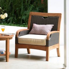 a chair and table sitting on a patio