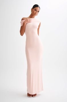 Skip the fomalitiesThe CASSANDRA Off Shoulder Slinky Maxi Dress exudes sophistication with a touch of allure. Its asymmetrical neckline adds a modern twist, framing the shoulders beautifully. With drop shoulders providing an elegant drape, this dress offers effortless charm. The ruched overlay adds texture and dimension, enhancing the silhouette with subtle intrigue. Lined for comfort and quality, and featuring a bodycon fit, the Cassandra is a versatile and chic choice for any occasion, ensuring you look and feel your best with every wear. One Shoulder Dresses, Fashion Dresses For Women, Dresses Date Night, Shoulder Dresses, Maxi Dress Sale, Pink Maxi, Asymmetrical Neckline, Date Night Dresses, Wedding Fashion