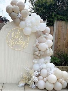 an arch made out of balloons and snowflakes