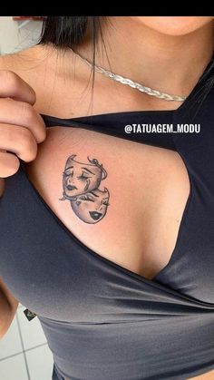 a woman with a tattoo on her chest