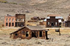 an old western town in the middle of nowhere with no people or vehicles on it