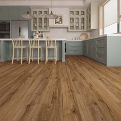 an image of a kitchen setting with wood flooring