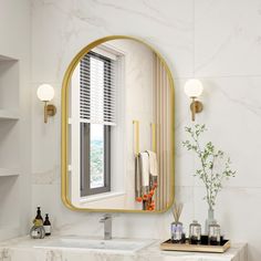 a bathroom with a sink, mirror and shelves