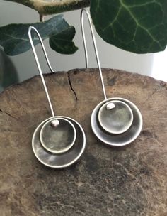 Pretty Sterling Silver Disc Earrings. These oxidised sterling silver disc earrings are simple but striking Handmade from sterling silver they are substantial but lightweight to wear. They hang on the simplest of hooks to compliment their beautiful minimalist look. MATERIAL - Sterling Silver FINISH - Oxidised GIFTS - I'm happy to post items directly to your gift recipient and can include a hand written note, just let me know in the 'Notes To Seller' section when purchasing. PROCESSING TIME - I tr Minimalist Silver Earrings, Earrings Oxidised, Boho Silver Earrings, Simple Silver Earrings, Earring Silver, Silver Earrings Handmade, Disc Earrings, Jewellery Handmade, Metal Words