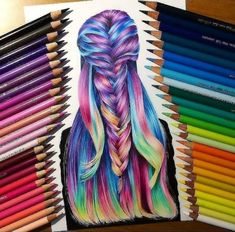 colored pencils next to a drawing of a girl with long hair and braided bangs