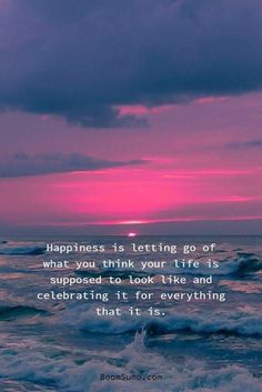 a sunset with the words happiness is letting go of what you think your life is supposed to look like and celebrating it for everything that