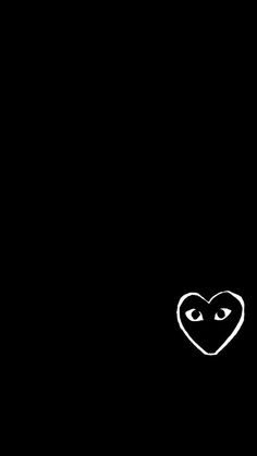 a black background with a white heart on the left and an eye in the middle