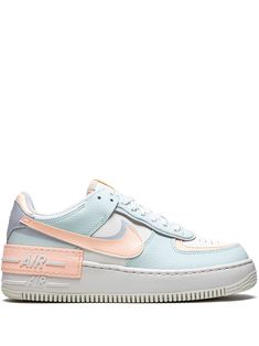 Light blue/pink/white leather/rubber AF1 Shadow sneakers from NIKE featuring signature Swoosh logo detail, contrasting panel detail, round toe, front lace-up fastening, logo patch at the tongue, branded insole and rubber sole. These styles are supplied by a premium sneaker marketplace. Stocking only the most sought-after footwear, they source and curate some of the most hard to find sneakers from around the world.. | Nike AF1 Shadow sneakers Nike Af1 Shadow, Rave Shoes, Nike Shoes Air Force, All Nike Shoes, Nike Air Shoes, Air Forces