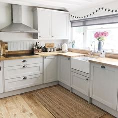 the kitchen is clean and ready for us to use in its new owner's home