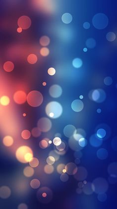 an abstract blurry background with blue and red lights