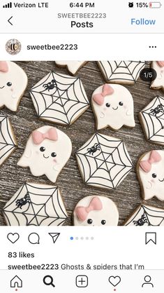 cookies decorated with icing and sprinkles are displayed on a wooden table