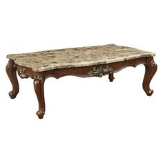 an antique coffee table with marble top and carved wood frame, on white background for display