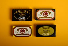 three different types of soaps on a yellow surface with the word zallo written below them