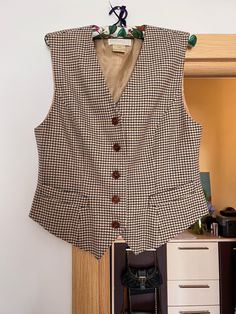 The Escada vest is in excellent condition  bust 51cm / 20in waist 46cm / 18.1in Vintage Sweater Vest For Fall Workwear, Retro Sleeveless Outerwear For Work, Retro Sleeveless Vest For Work, Classic Brown Vest Top, Vintage Workwear Vest Outerwear, Retro Brown Vest For Workwear, Retro Brown Vest For Work, Vintage Workwear Vest, Vintage Vest For Spring Workwear