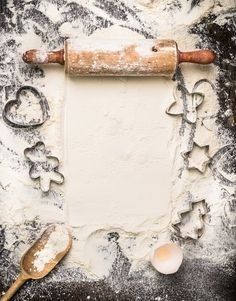 an image of baking utensils and dough