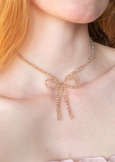 This champagne beaded bow necklace is an intricately, handmade piece of jewelry that goes well with everything. They can easily be dressed up or down for casual and formal/going-out looks, making a great everyday necklace that is still eye-catching and unique. A great amount of care, passion, and attention to detail goes into every step of its creation, making it a truly high-quality and special piece of jewelry that you can feel good about wearing for years to come. This makes the perfect gift Adjustable Necklace With Decorative Bow For Party, Elegant Gold Necklace With Decorative Bow, Gold Bow Necklace For Party, Gold Necklace With Bow For Party, Gold Necklace With Decorative Bow For Party, Elegant Necklace With Decorative Bow For Party, Beaded Bow Necklace, Beaded Bow, Going Out Looks