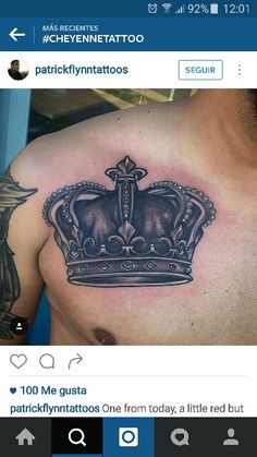 a man with a crown tattoo on his chest