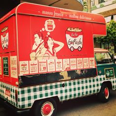 a food truck parked in front of a building