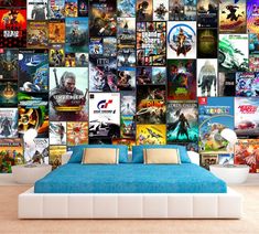 a bed sitting under a wall covered in lots of movie poster'd artwork on it