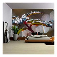 a bedroom with a large wall mural in the middle and a bed on the other side