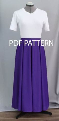 a purple and white dress on a mannequin