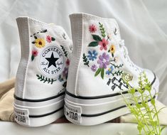 Price includes: Shoes + Embroidery as shown Embroidered converse/Custom Converse Platform/WEDDING Converse Mountain And Colorful Flowers/Custom Logo Butterfly/Best Gift For Her I was born and raised in a family with a long embroidery tradition in a small village. My family mainly embroideries traditional clothes. I want them to be different, I put that art into everyday use: shoes, t-shirts, jeans, backpacks, ... In addition to the embroidery patterns that I have posted, I am happy to receive your own custom-made embroidery patterns and for a very small fee of $ 10-50 (depending on the difficulty of the embroidery pattern) Any questions you can message me directly via Etsy Thanks for visiting my little store :)