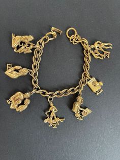 Here is a souvenir gold tone charm bracelet featuring the commandments.  Keep for yourself or recycle the charms onto a new bracelet.   There are seven charms on the bracelet.  Check the picture and video for more details. Christian Crafts, New Bracelet, Craft Jewelry, Charm Bracelets, Houston Tx, Jewelry Crafts, Picture Video, Jewelry Bracelets, Gold Tones