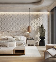 a large white bed sitting in a bedroom next to a tall vase filled with plants