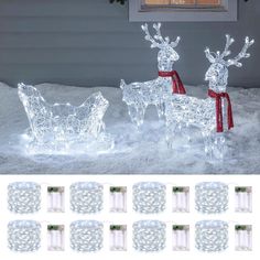 lighted reindeers and sleigh in the snow