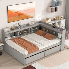 a bedroom with a bed, bookcases and shelves on the wall above it