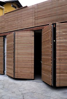 the building is made out of wood slats