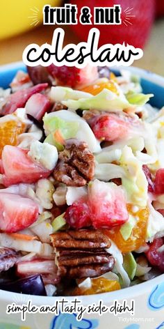 fruit and nut coleslaw in a blue bowl with the title overlay above it